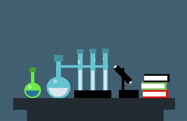 Science lab with beakers, test tubes, microscope and books